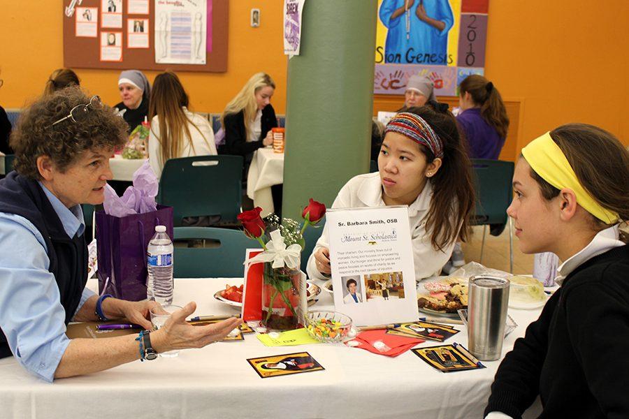 Seniors Gabbie Ismert and Madi Weiseler sat with Sr. Barbara Smith from the Benedictine Sisters. 