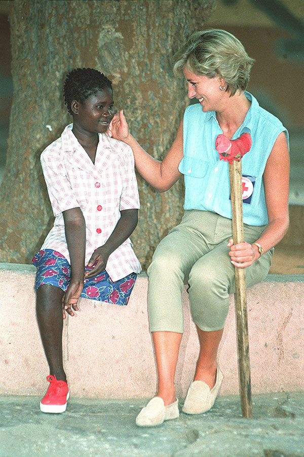 Diana, Princess of Wales, with Sandra Tigica, 13, at the orthopaedic workshop in Neves Mendinha, near Launda, Angola Jan. 14, 1997. 