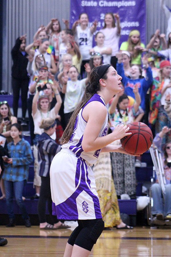 Senior co-captain Sarah Totta shoots a free throw during the second half of the basketball game Nov. 17.