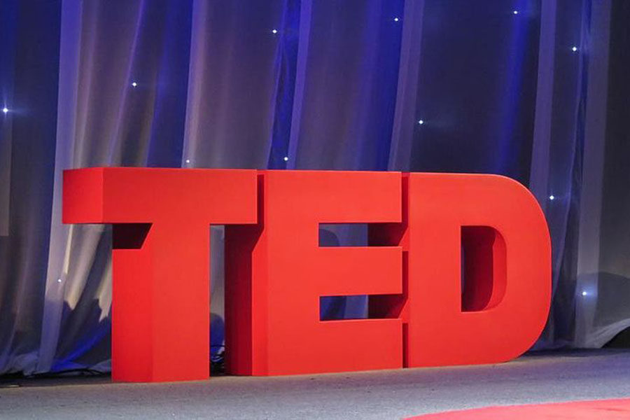 Before a talk begins, the TED letters are set up as a backdrop for the upcoming speaker.