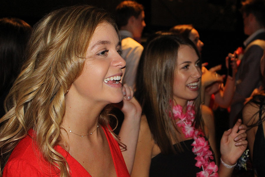 Sophomores Maeve Hogg and Elizabeth Finn laugh and dance to Crank That by Soulja Boy during last years Winter Formal, Dec. 2, 2017.