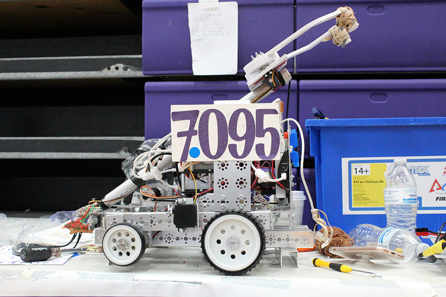 Robot 7095, built by the robotics team to carry objects the size of a volleyball, will be moving onto the state competition.