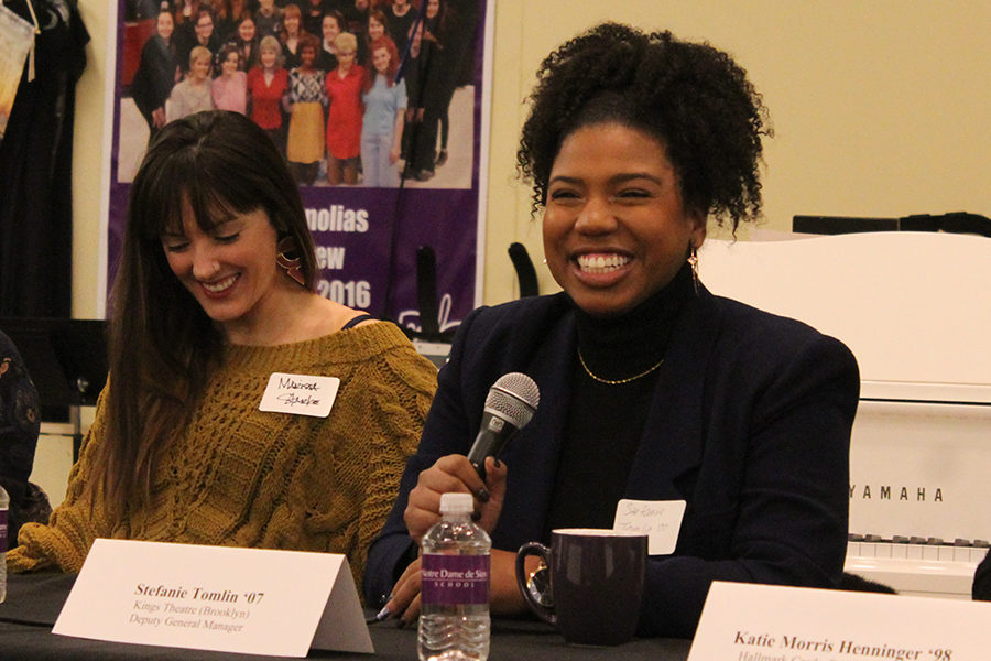 Alumna Stefanie Tomlin, class of 2007, smiles while answering a submitted question for the entertainment panel by a student at the biennial Career Day Jan. 29.