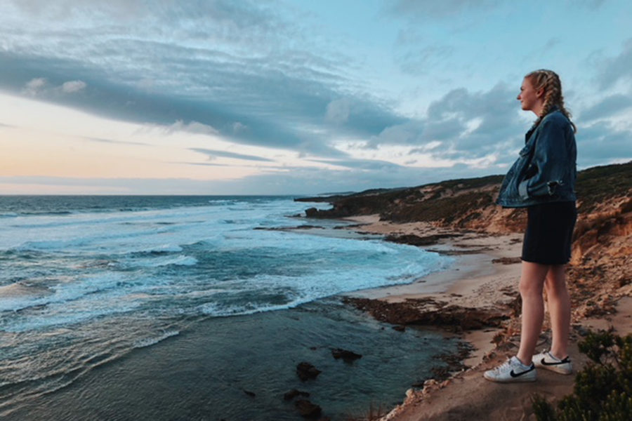 Senior Anna Tomka stands on the cliff side of the Blairgowrie lookout while admiring the view.