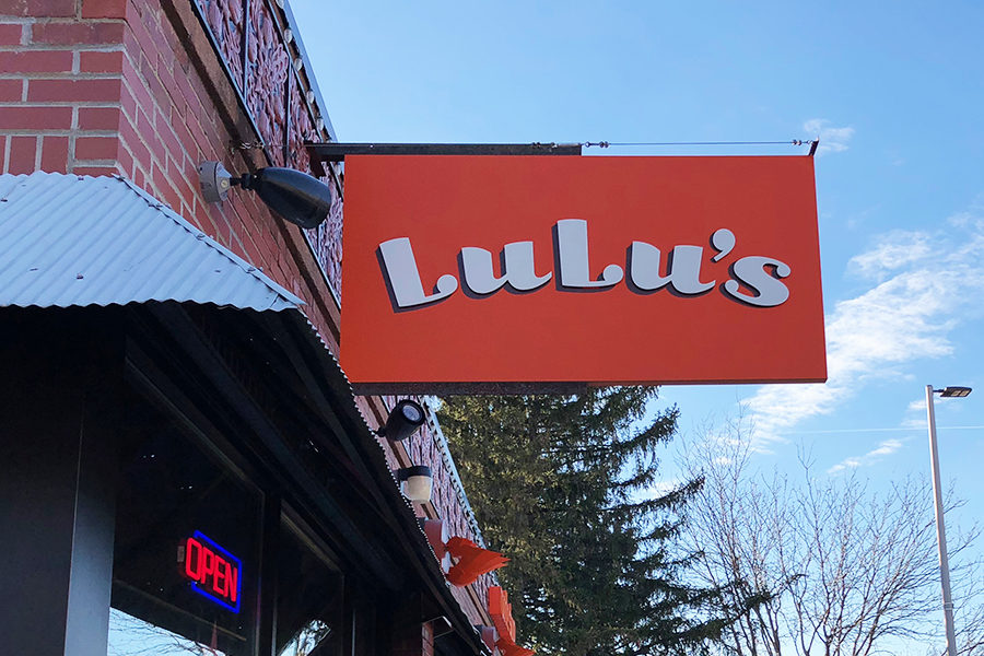 The outdoor sign displaying the restaurant name "Lulu's" outside of the Westwood location.  