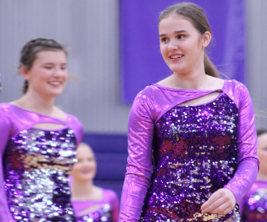 Senior Lily Muehlebach prepares to begin her performance with the dance team at the pep assembly, Sep. 6.