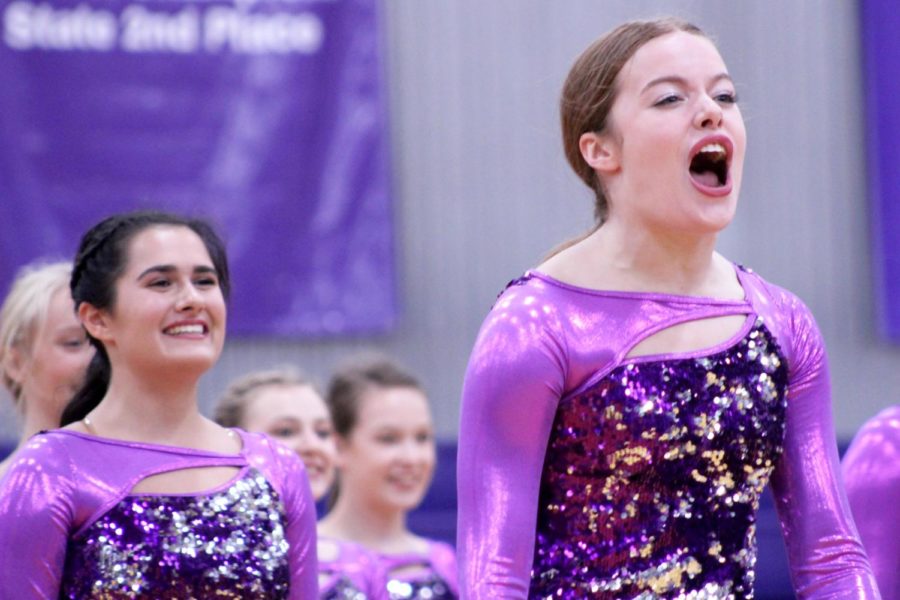 Senior Executive Captain Kristen Rogge directs her team during the dance that she choreographed along with the other senior executives, at the pep assembly Sept. 6. 