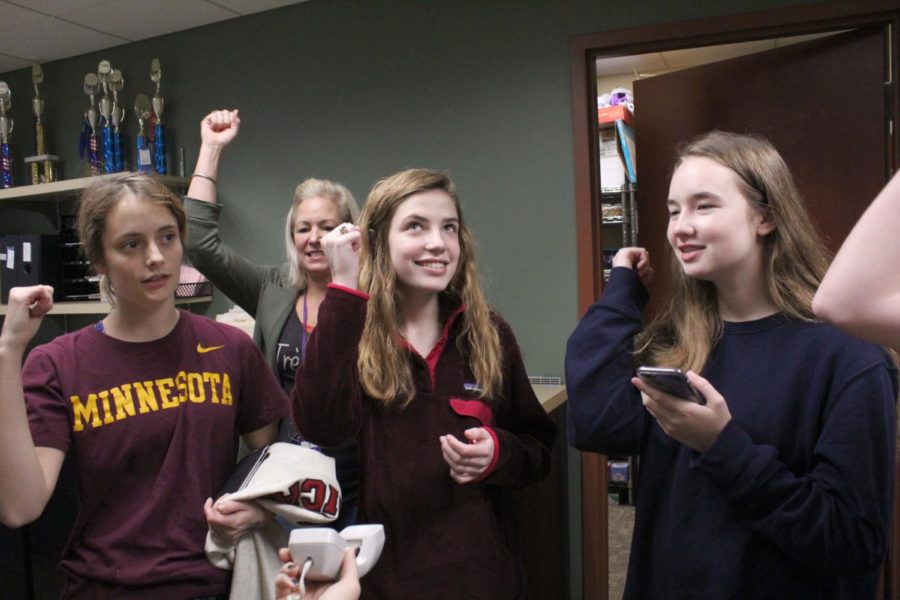 Juniors Phoebe Mullen, Rachel McRae, and Payton Wade sing the school song over the morning announcements Nov. 9.