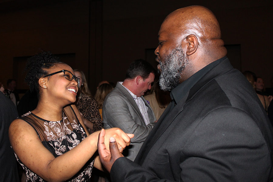 Freshman Kenzie Warren and her father David Warren dance together at the father-daughter dance Feb. 10. 