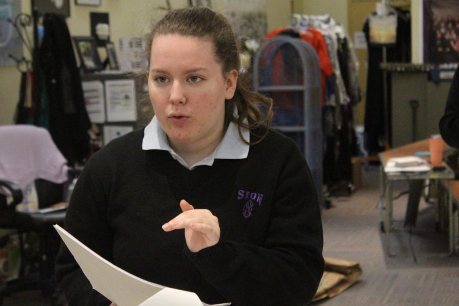 Senior Tess Prusa rehearses one of her monologues from the play about a 
conversation between mother and 
daughter.