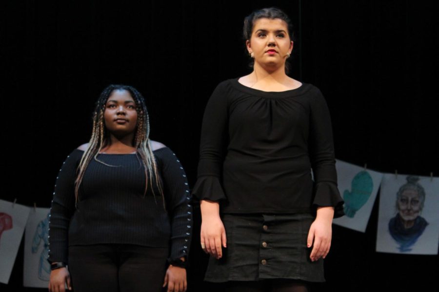 At the dress rehearsal March 21, junior Maya Bair and senior Tempest Malone perform in the spring play, “Love, Loss and What I was Wearing.” The play was a collection of mologues depicting the reality of being a woman.