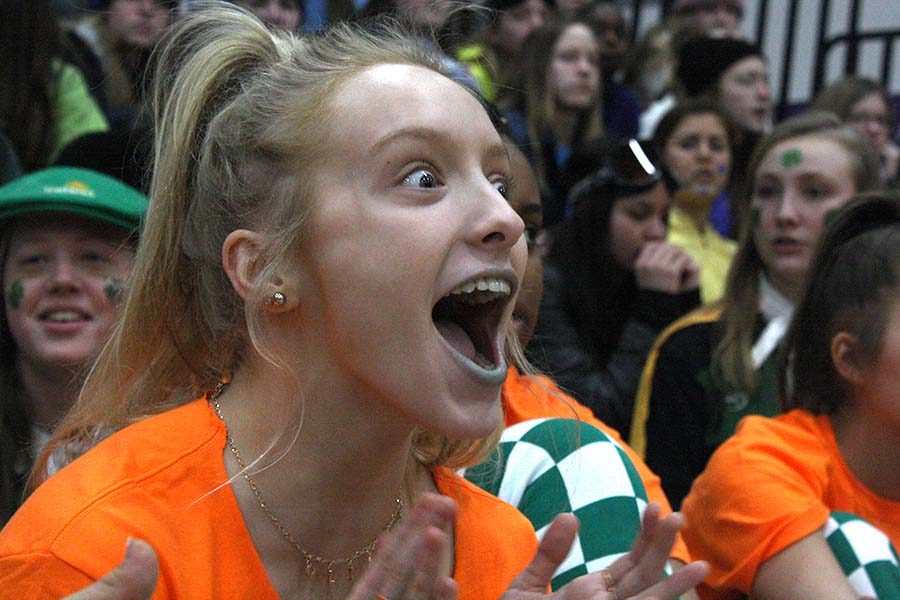 Junior Olivia Townsend watches the final round of blindfolded musical chairs during Sion Olympics March 7. Junior Peyton Wiewel won the game for the juniors.