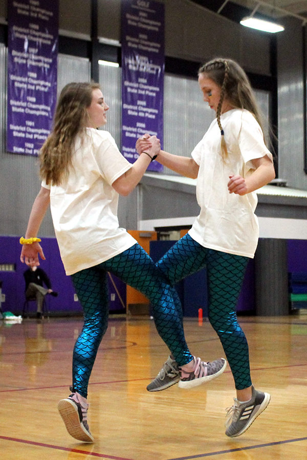 During Sion Olympics March 7, sophomores Paxton Misemer and Katelyn Brinkman dance with the rest of sophomore Stuco. The sophomores represented the country of the Bahamas.