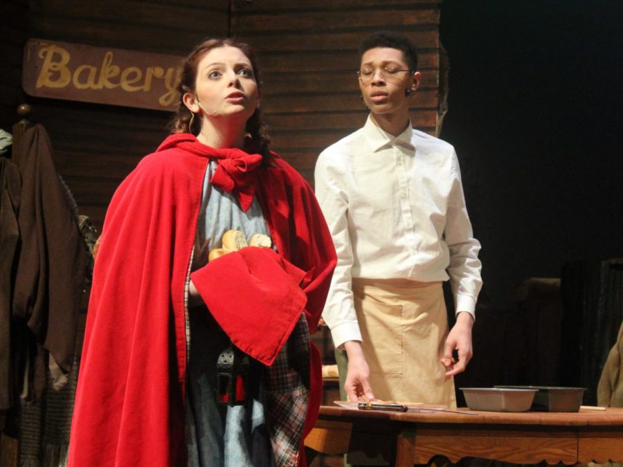 Freshman Olivia Mancina sings in the opening scene of “Into the Woods” Jan. 25, while holding a basket of bread for Grandma. 