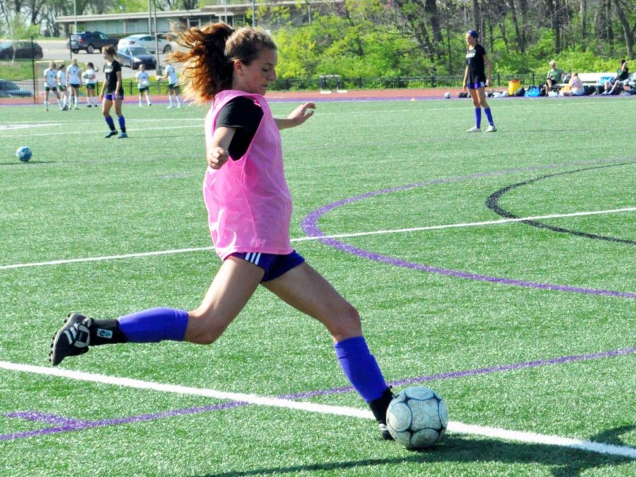 Junior Rose Orrick warms up before the soccer game versus Lafayette High School. 