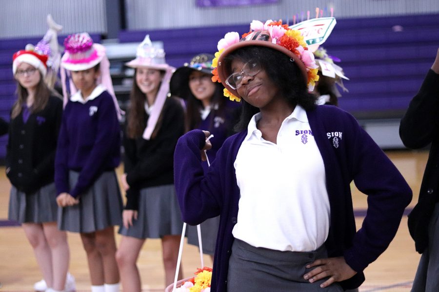 Freshman Kaila Traylor flaunts her flower themed beanie for the audience.