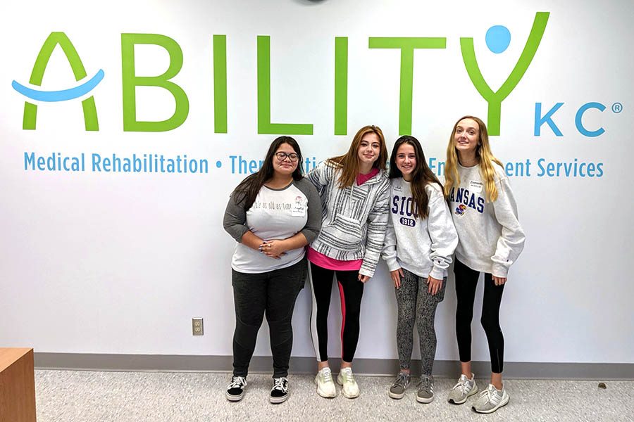 Freshmen Chrystal Benitez, Grace Gaither, Kate Beaulieu and Samantha Molle volunteered at Ability KC for freshman day of service Oct. 16.