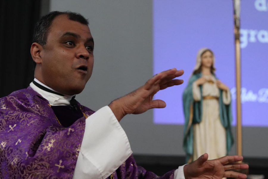 Father Sunoj Thomas precided over the annual Mother-Daughter-Grandmother Mass Nov. 5 in the gym. 