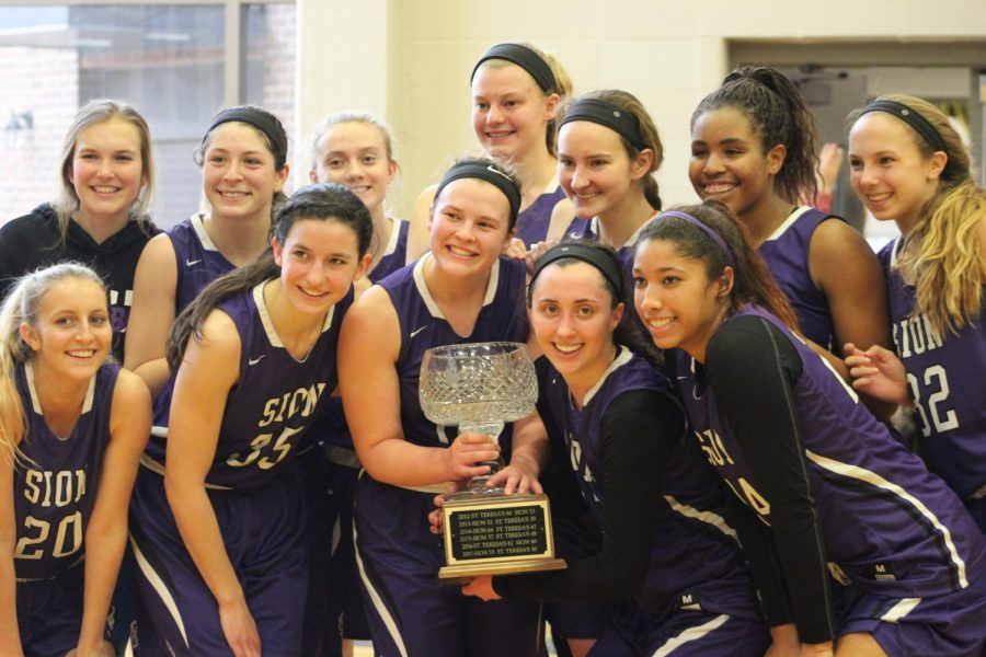 My team and I hold the Irish Cup my sophomore year.