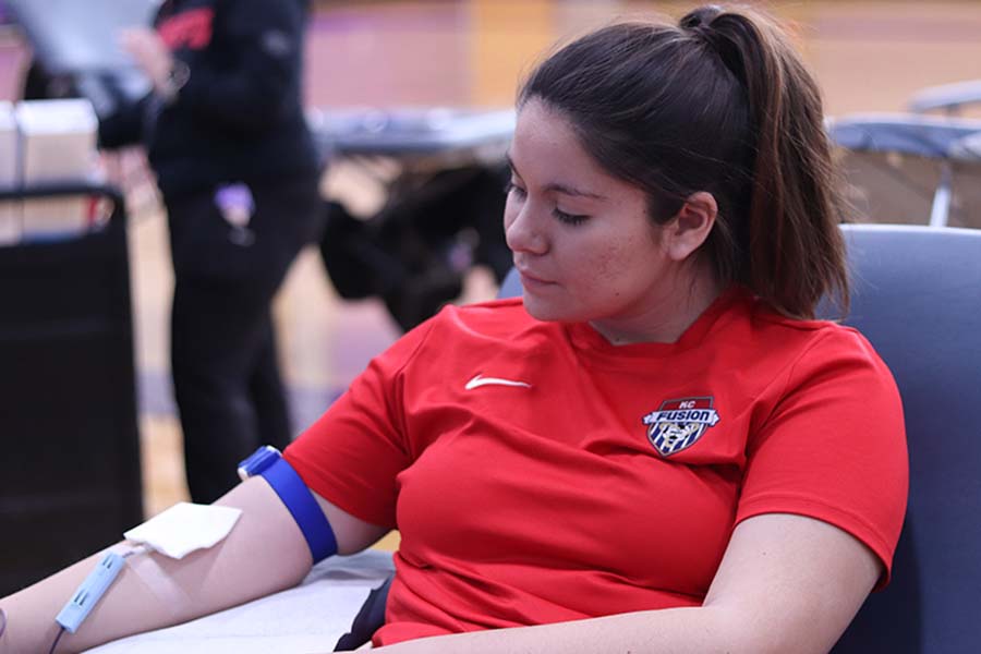 During the annual blood drive junior Genevieve Klobe donated Feb. 14 in the gym to Community Blood Center.