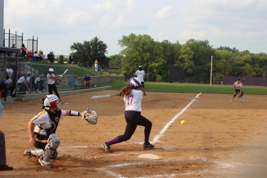 Junior Angelina Ferrara takes a swing at the rivals pitch Sept. 16.