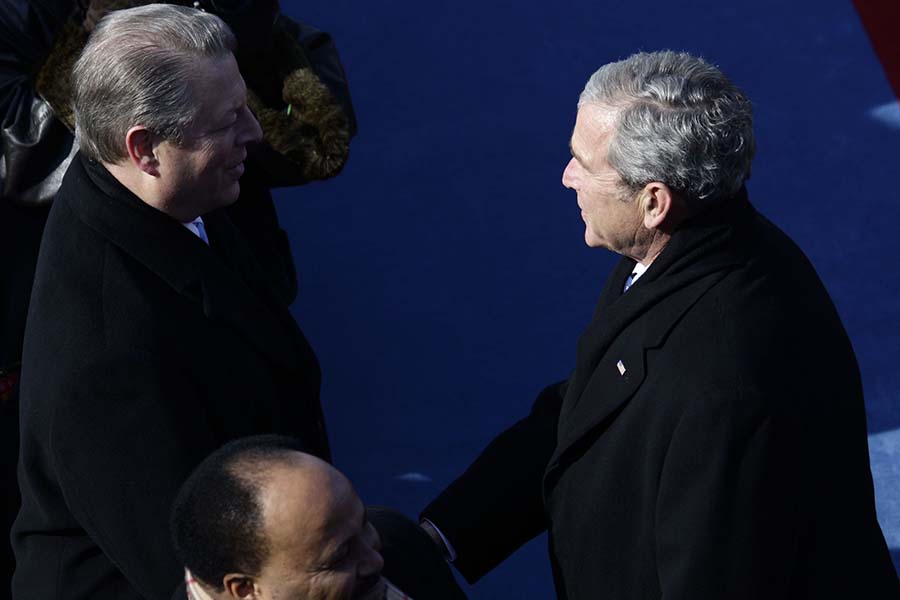 Former Vice President Al Gore, left, and President George W. Bush shake hands at the inauguration as  Vice President and President respectively at the U.S. Capitol in Washington, D.C., Tuesday, January 20, 2009. (Chuck Kennedy/MCT)