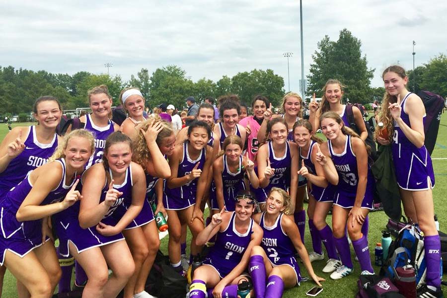 The varsity field hockey teams achieves a win in their St. Louis tournament in 2019. 