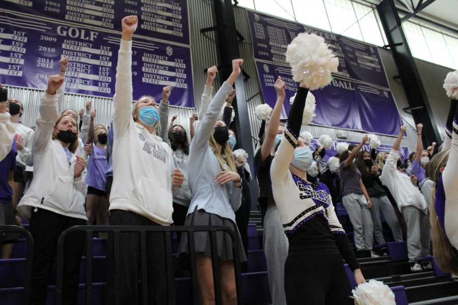 Seniors participate in the singing of the school song.