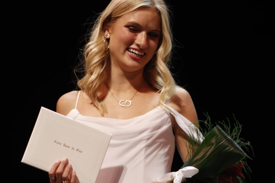 Grace Townsend '22 receives her diploma during the Commencement ceremony. 