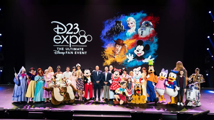 Beloved Disney characters and Disney CEO Bob Chapek pose for a photo prior to the kickoff of the D23 Exposition in 2019. 