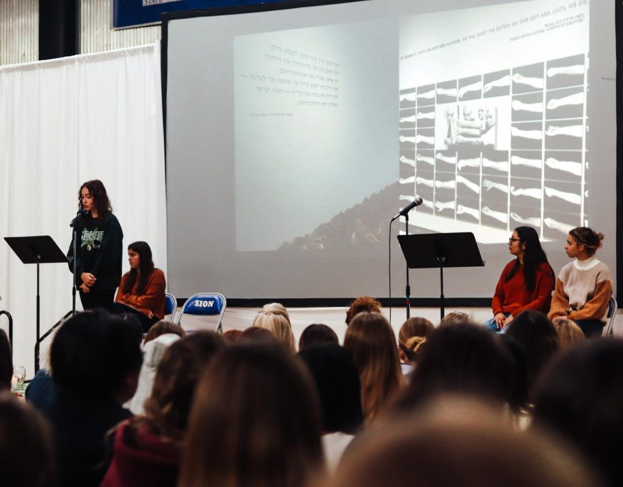 Sophomore Greta Grossman reminds the audience of the horrors of the Holocaust and reminds them of the still daily struggles as anti-semantic groups rise.