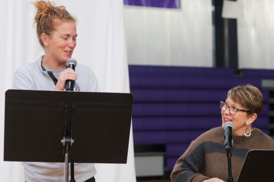 Athletics director Kate Pilgreen, and music director Elizabeth Mulkey share a duet at the prayer service.