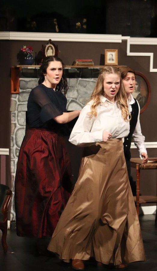 After declaring Laurie, played by Barstow junior Dyland Markey, as their unofficial brother, senior Addie Hiestand and junior Noelle Bertrand sing "Five Forever."