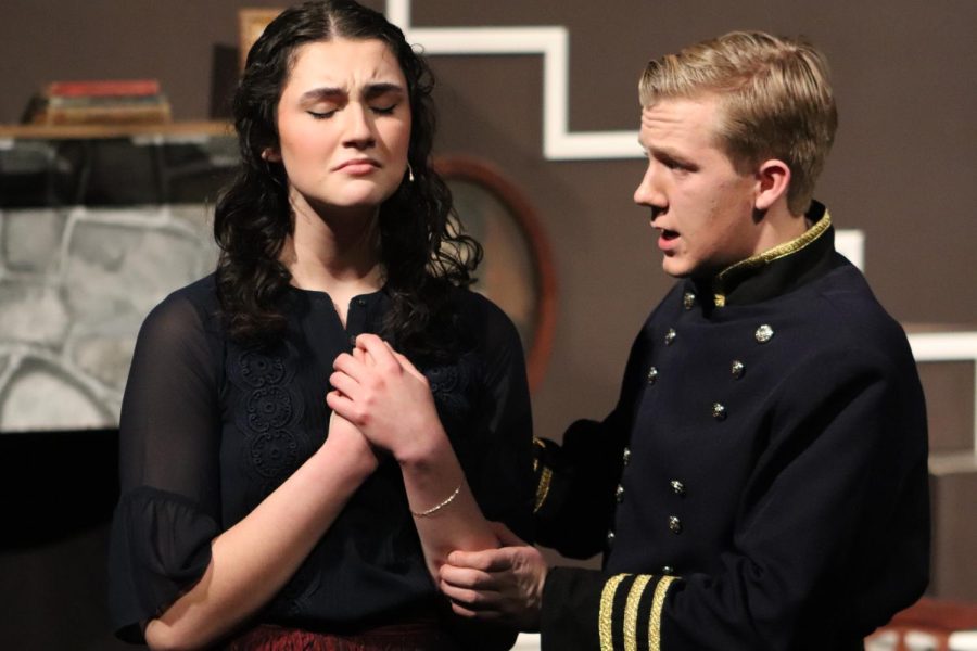 Struck with sadness over their separation, Meg and Mr. Brooke, played by junior Noelle Bertrand and Whitefield Academy junior Henry Schulewitz, respectively, sing "More Than I Am."