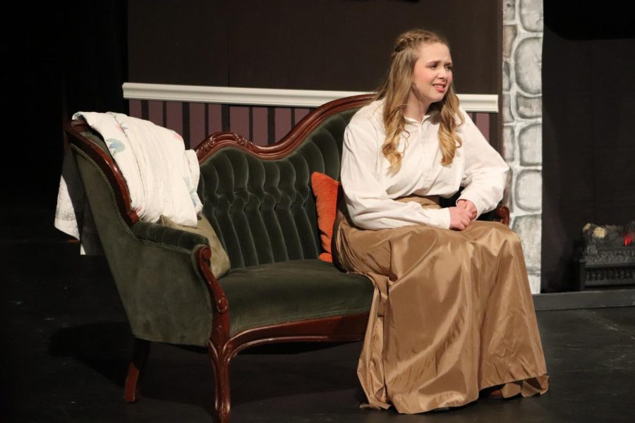 Contemplating her relationship with Laurie, Jo March, played by senior Addie Hiestand, sings "Astonishing."