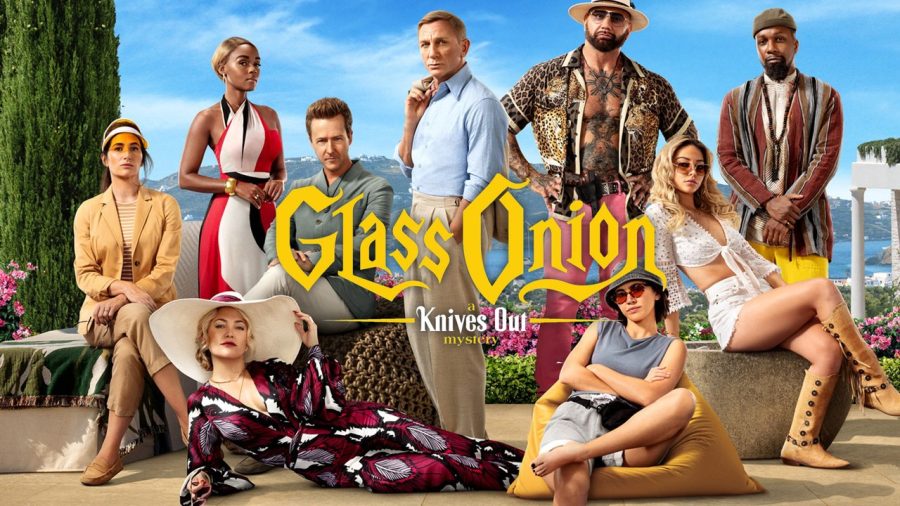 The cast of Rian Johnson's "Glass Onion: A Knives Out Mystery" poses for a cast photo. 