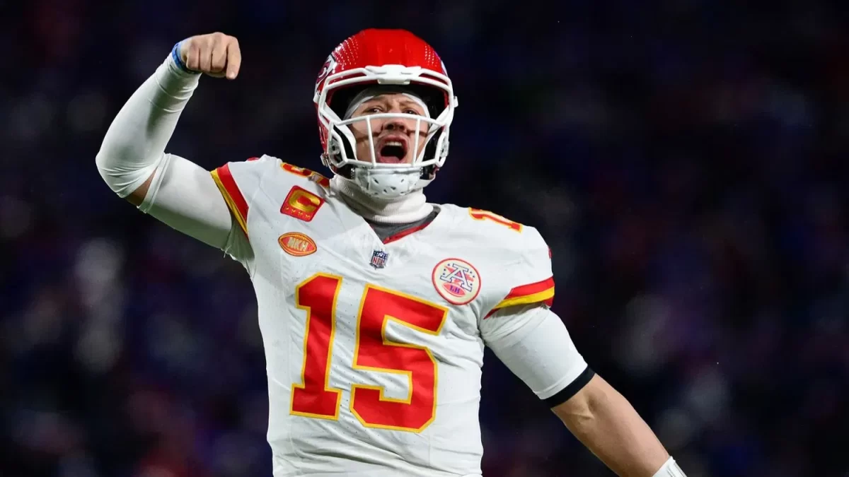 After winning the AFC divisional game, Chief's quarterback Patrick Mahomes celebrates his team's victory.