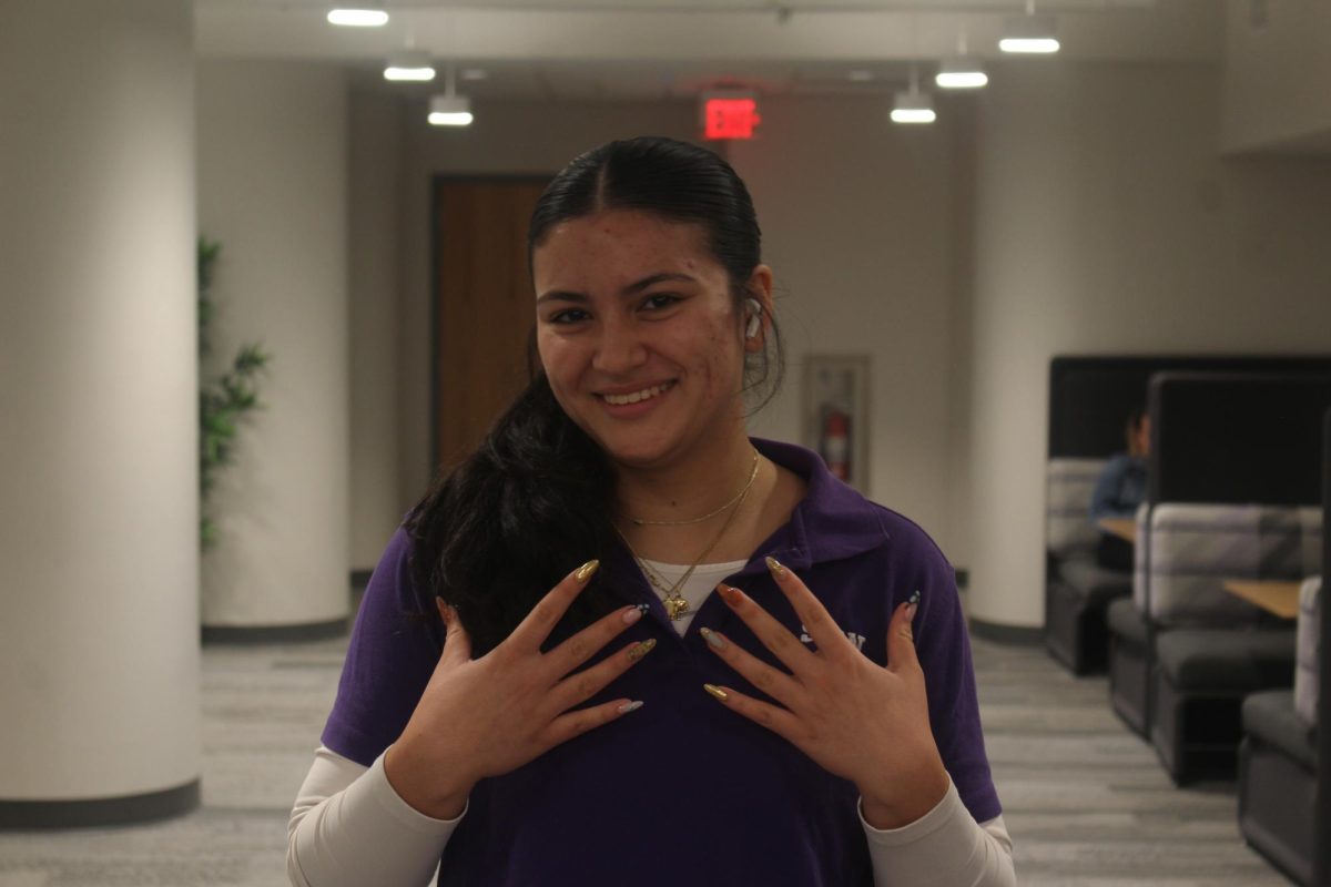 Sophomore Elena Vergara shows off her new nail design. Vergara 