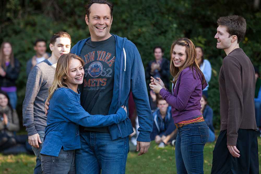 Britt Robertson (center, left) stars as Kristen, opposite Vince Vaughn who portrays David Wozniak in DreamWorks Pictures' heartfelt comedy, "Delivery Man."