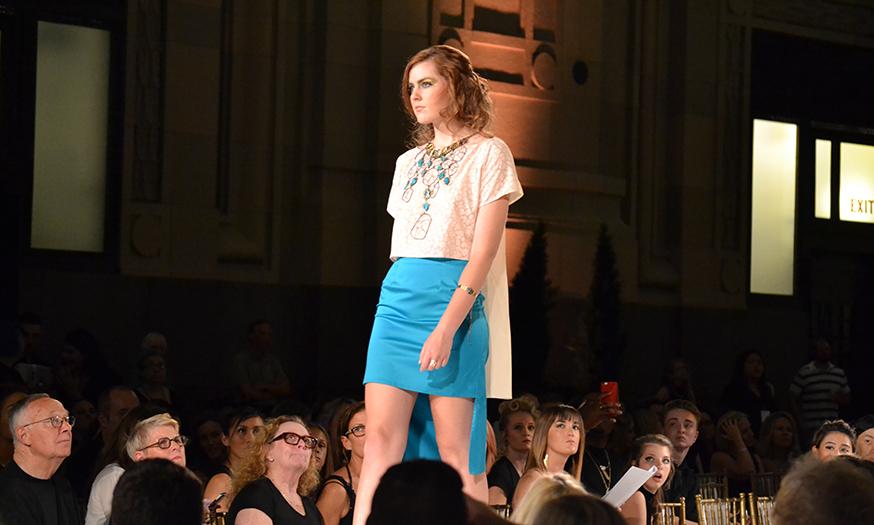 Senior Bella Lightner struts on the Kansas City Fashion Week runway. 