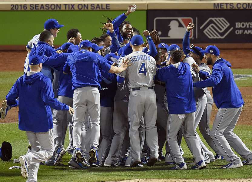 The Kansas City Royals celebrate after defeating the New York Mets 7-2 to win the World Series on Sunday, Nov. 1, 2015, at Citi Field in New York. (David Eulitt/Kansas City Star/TNS)