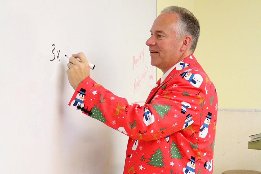 Math teacher Reynold Middleton sports a winter wonderland jacket he received from his brother-in-law. Money was collected for the Della Lamb Community Services to help local refugee families at Christmas time. It cost $1 to wear a Christmas sweater.