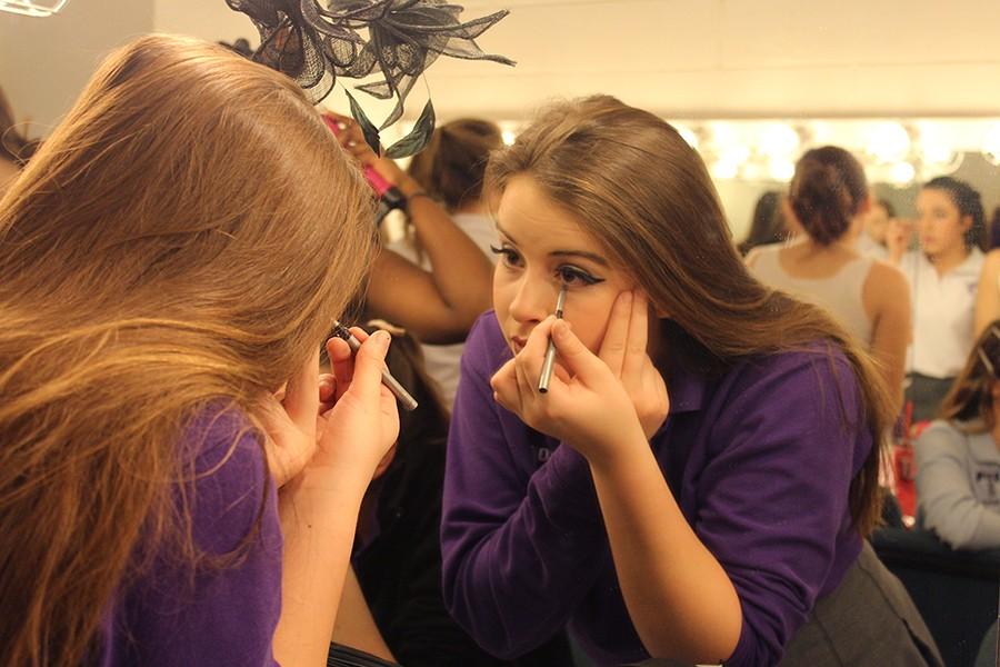 Sophomore Reagan Amato gets ready before the "Throughly Modern Millie" dress rehearsal Jan 21. This was her second Sion musical, and she played Daphne and was an understudy for both Mrs. Meers and Bun Foo. 