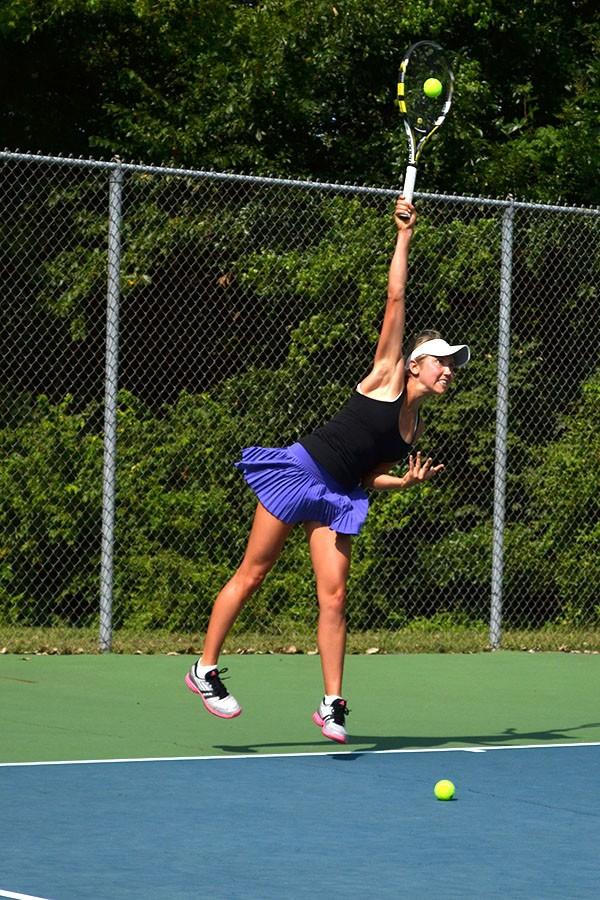 Junior Margo Gerke warms up for a match during the Sion Tennis season.