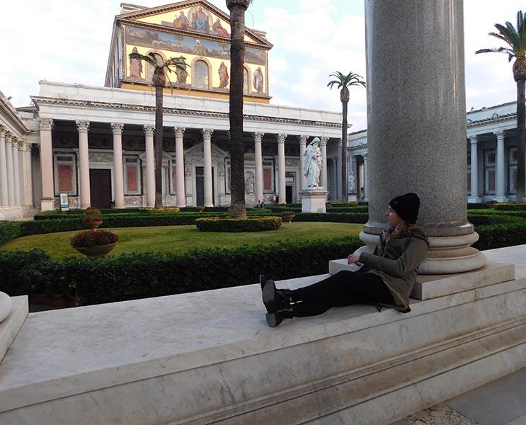 Sophomore Anna Tomka relaxes and takes in the beauty of St. Peter's Basilica. 