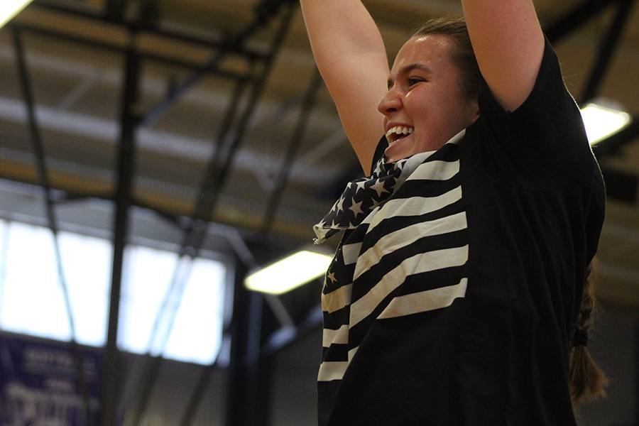 Senior Stephanie Ostrander cheers after the senior class won the relay game. 