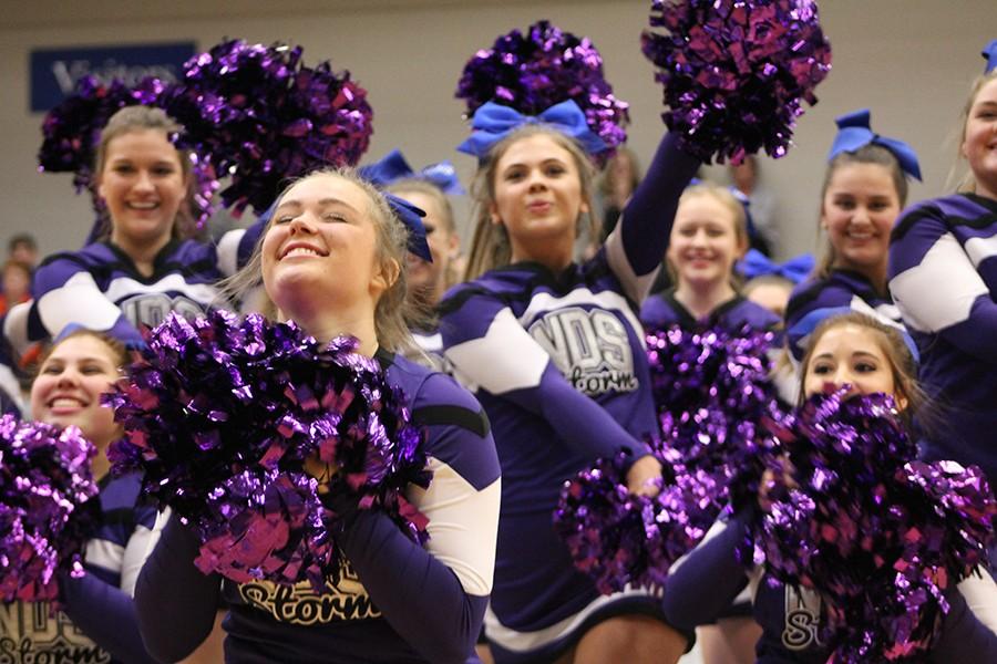 Cheer completes their halftime performance at Rockhurst High School during the Rockhurst v. Columbia Rockbridge basketball game Feb. 19. 