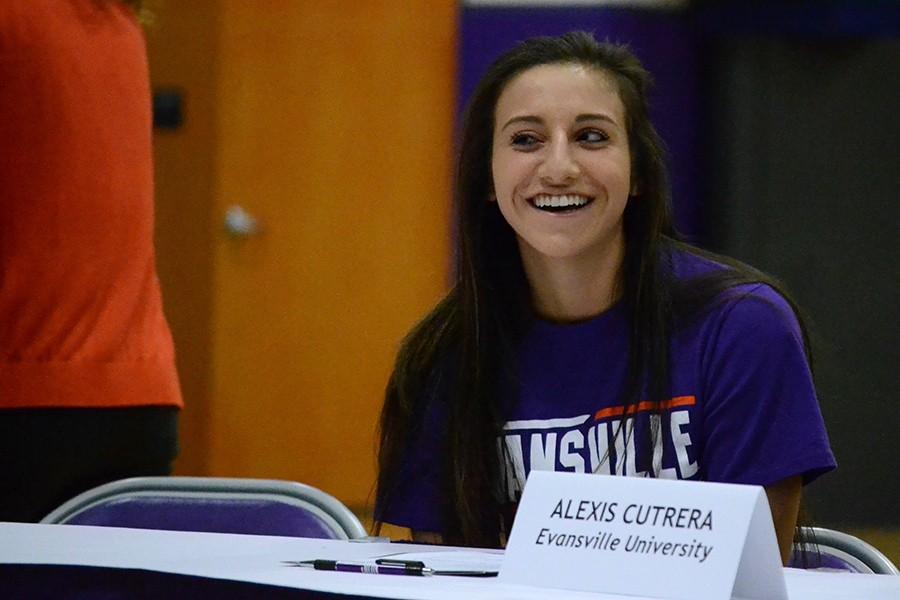 Senior Alexis Cutrera listens to teammates tell stories about her time on the Sion soccer team. 