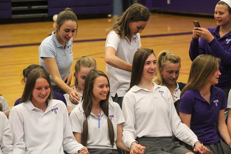 Girls prepare to get their haircut to donate to Pantene's Beautiful Lengths.