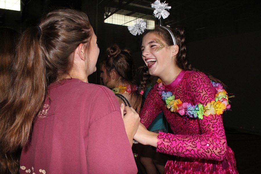 Freshman Reilly Jackoboice laughs with a friend during the dance.